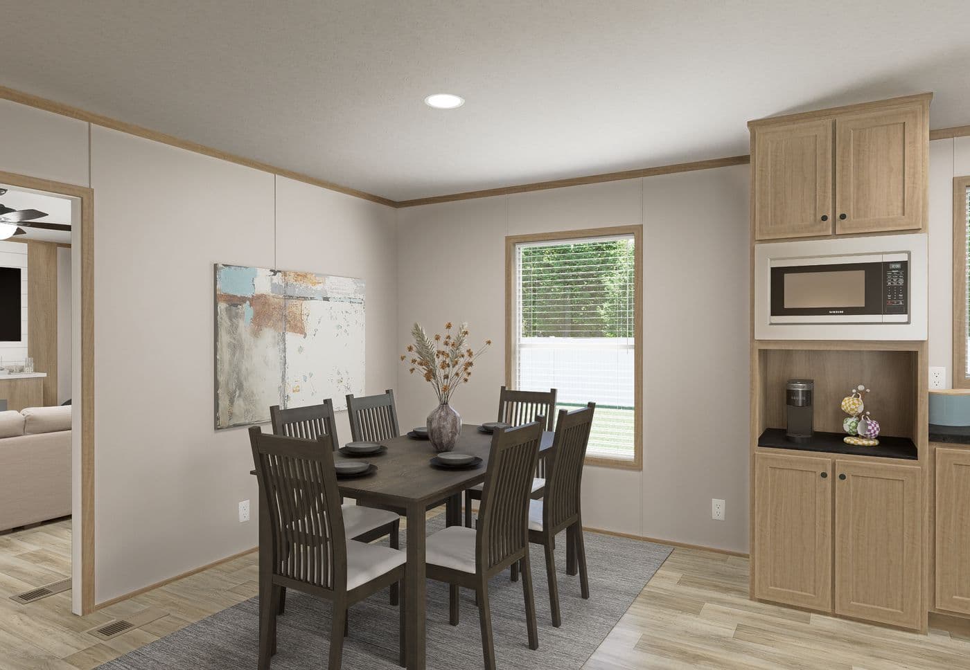 The THE MOUNTAINEER 72 Dining Area. This Manufactured Mobile Home features 3 bedrooms and 2 baths.