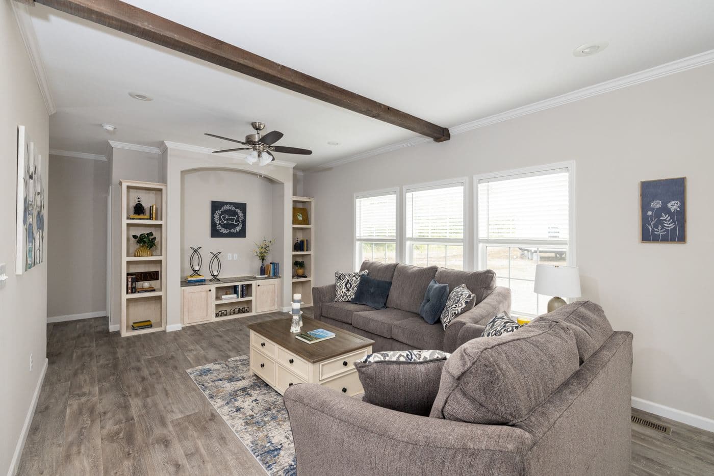 The THE ROGUE Living Room. This Manufactured Mobile Home features 3 bedrooms and 2 baths.