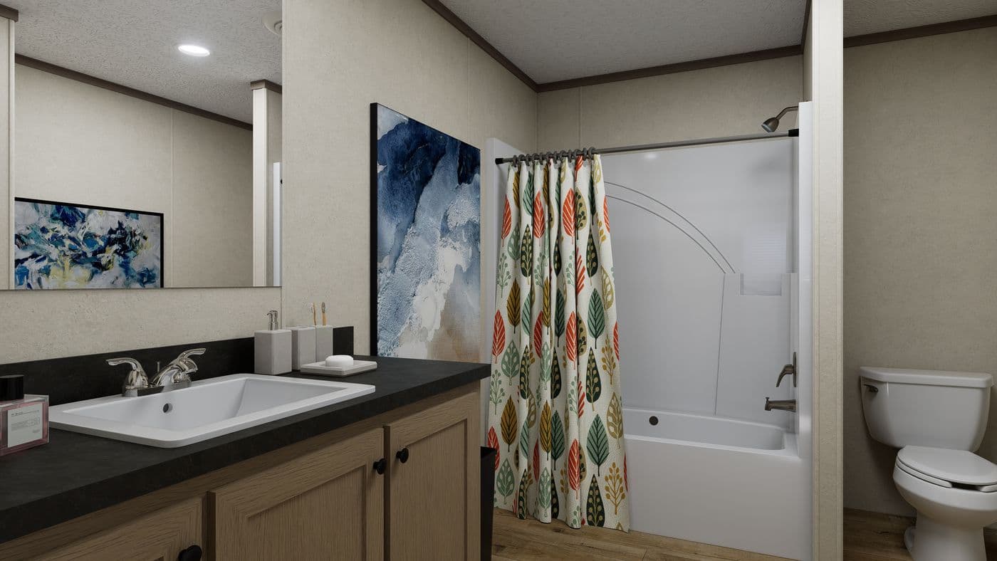 The 5224-CC55 STONEBRIDGE 52 Primary Bathroom. This Manufactured Mobile Home features 3 bedrooms and 2 baths.