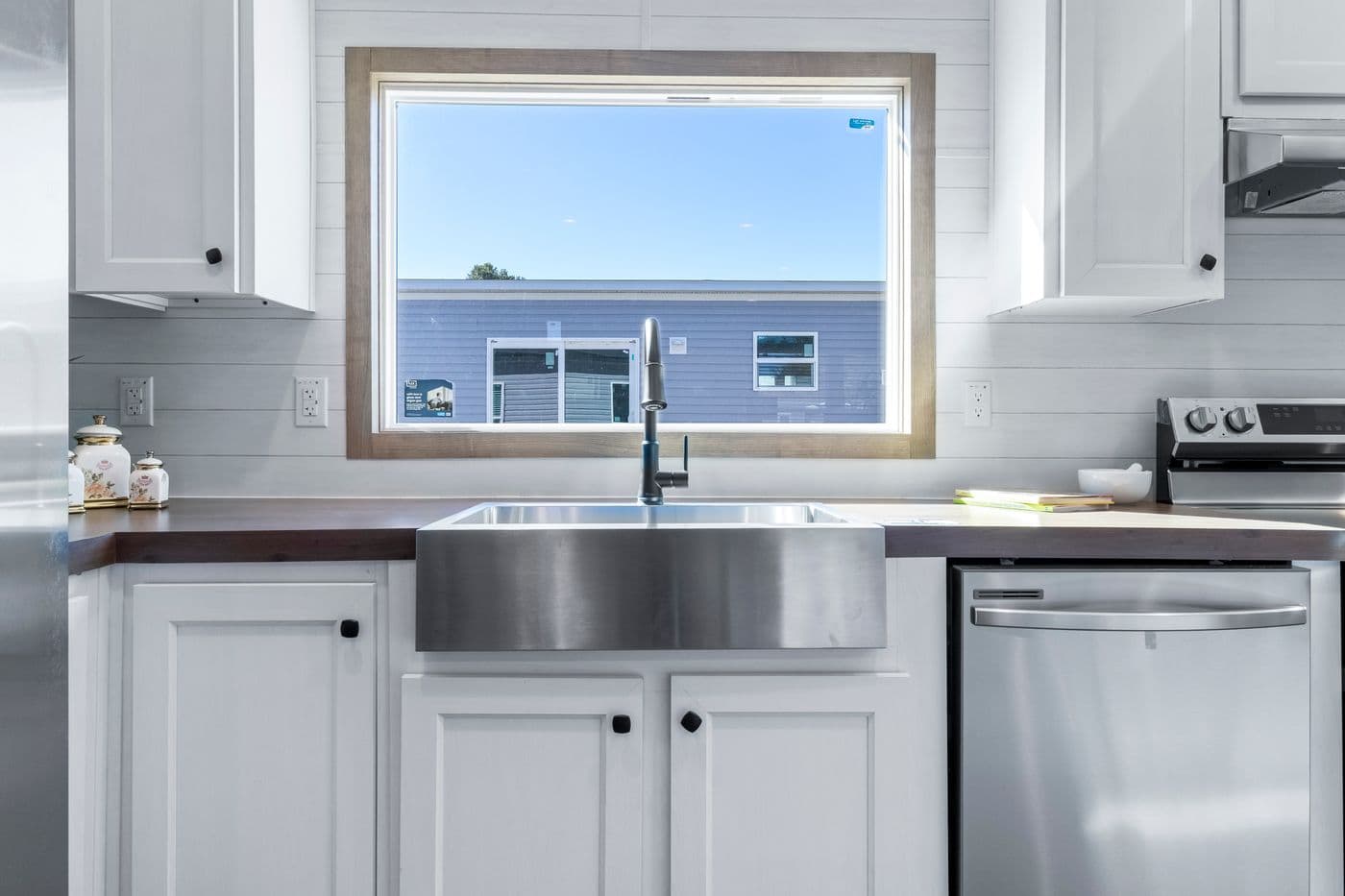 The THE BIG DEAL 52 Kitchen. This Manufactured Mobile Home features 3 bedrooms and 2 baths.