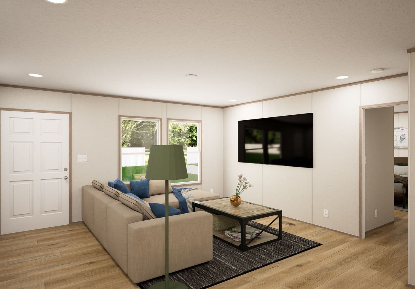 The GROVE Living Room. This Manufactured Mobile Home features 3 bedrooms and 2 baths.