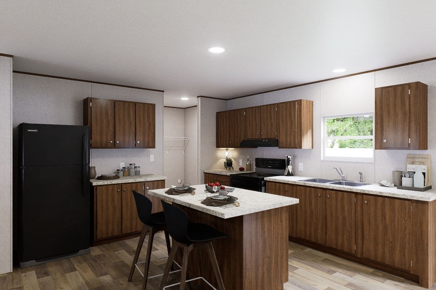 The OAK Kitchen. This Manufactured Mobile Home features 4 bedrooms and 2 baths.