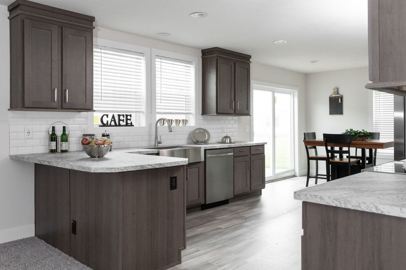 The HILL ST/5628-MS020-1 SECT Kitchen. This Manufactured Mobile Home features 3 bedrooms and 2 baths.
