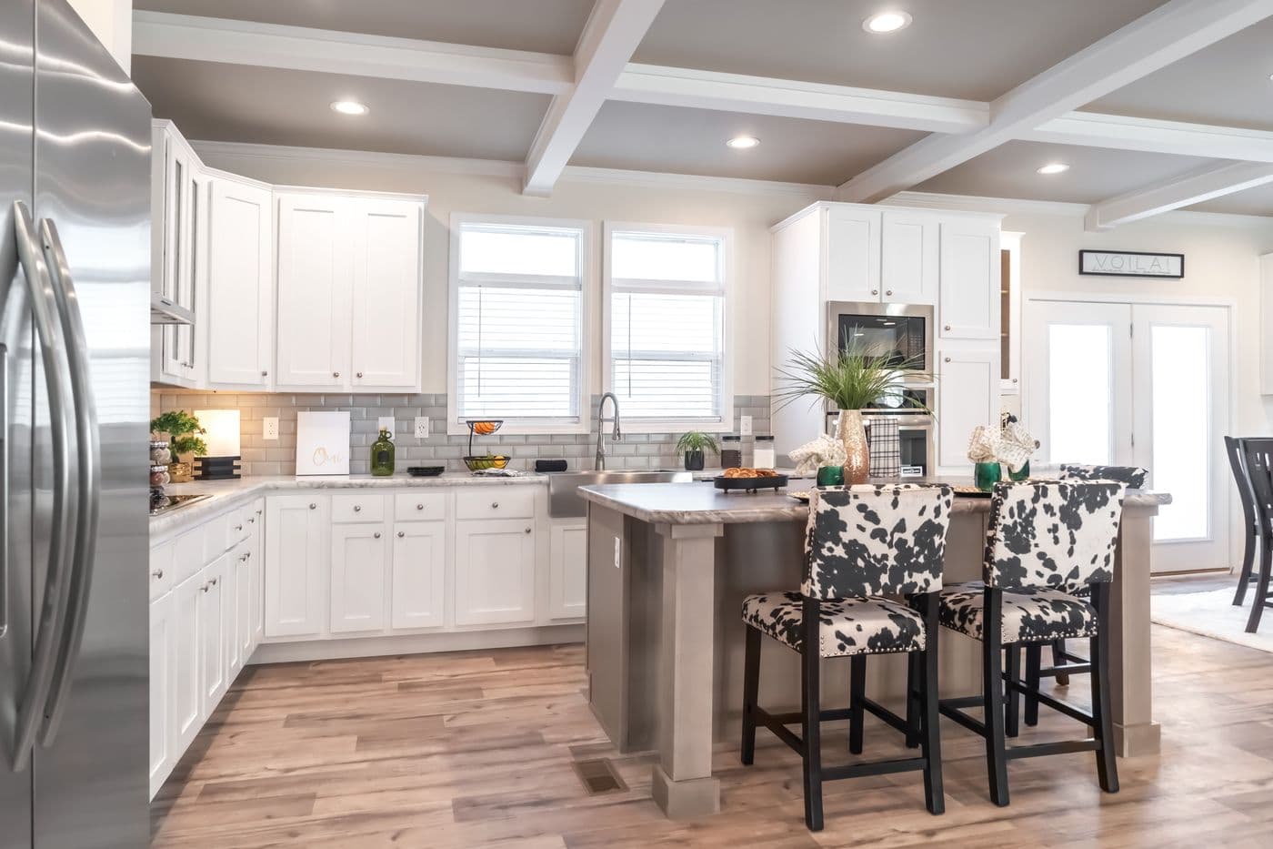 The SUPER 68 ELITE Kitchen. This Manufactured Mobile Home features 3 bedrooms and 2 baths.