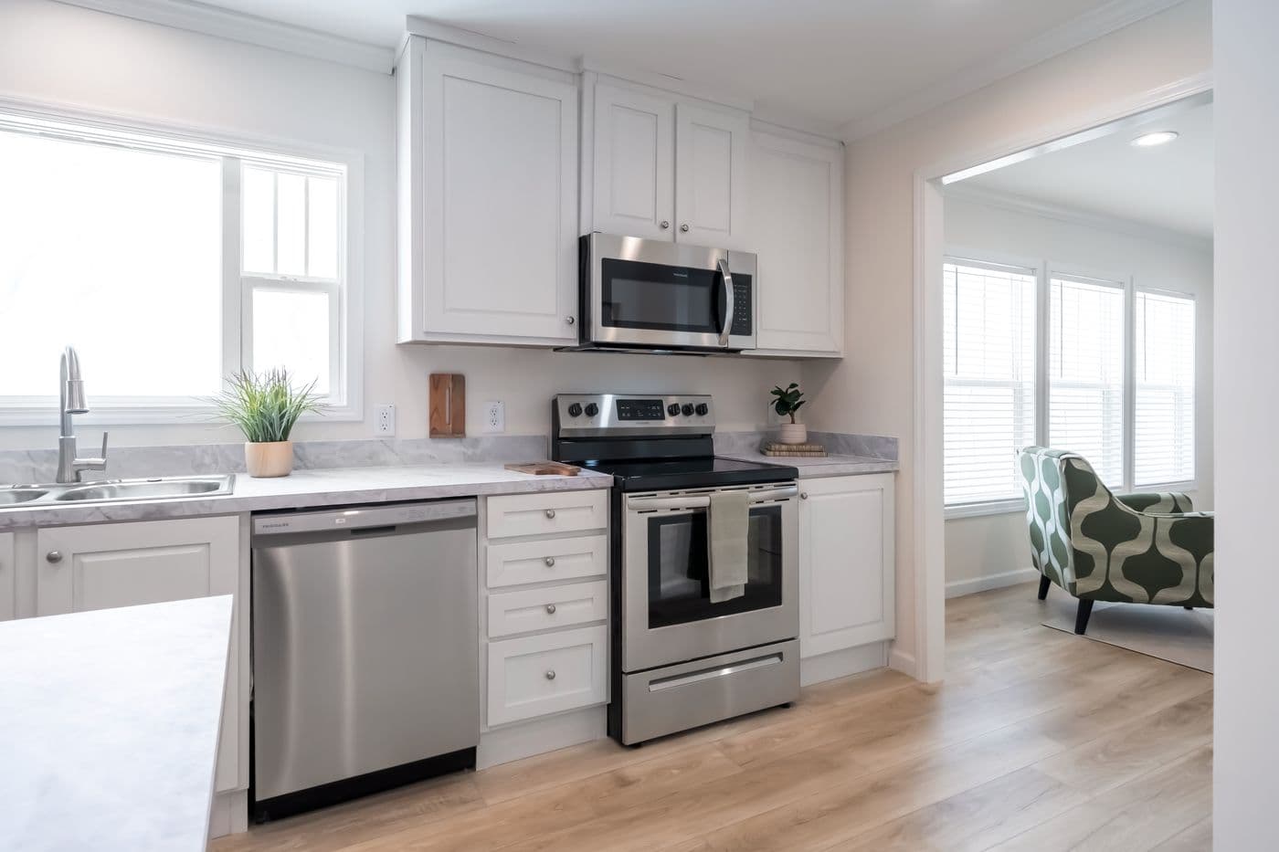 The 5430 "UWHARRIE" 7632 Kitchen. This Manufactured Mobile Home features 4 bedrooms and 2 baths.