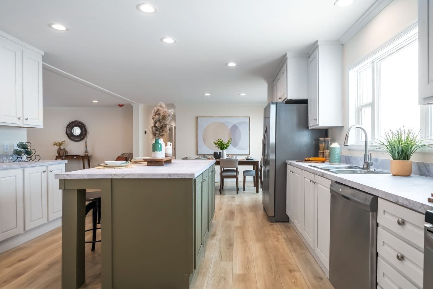 The 5430 "UWHARRIE" 7632 Kitchen. This Manufactured Mobile Home features 4 bedrooms and 2 baths.