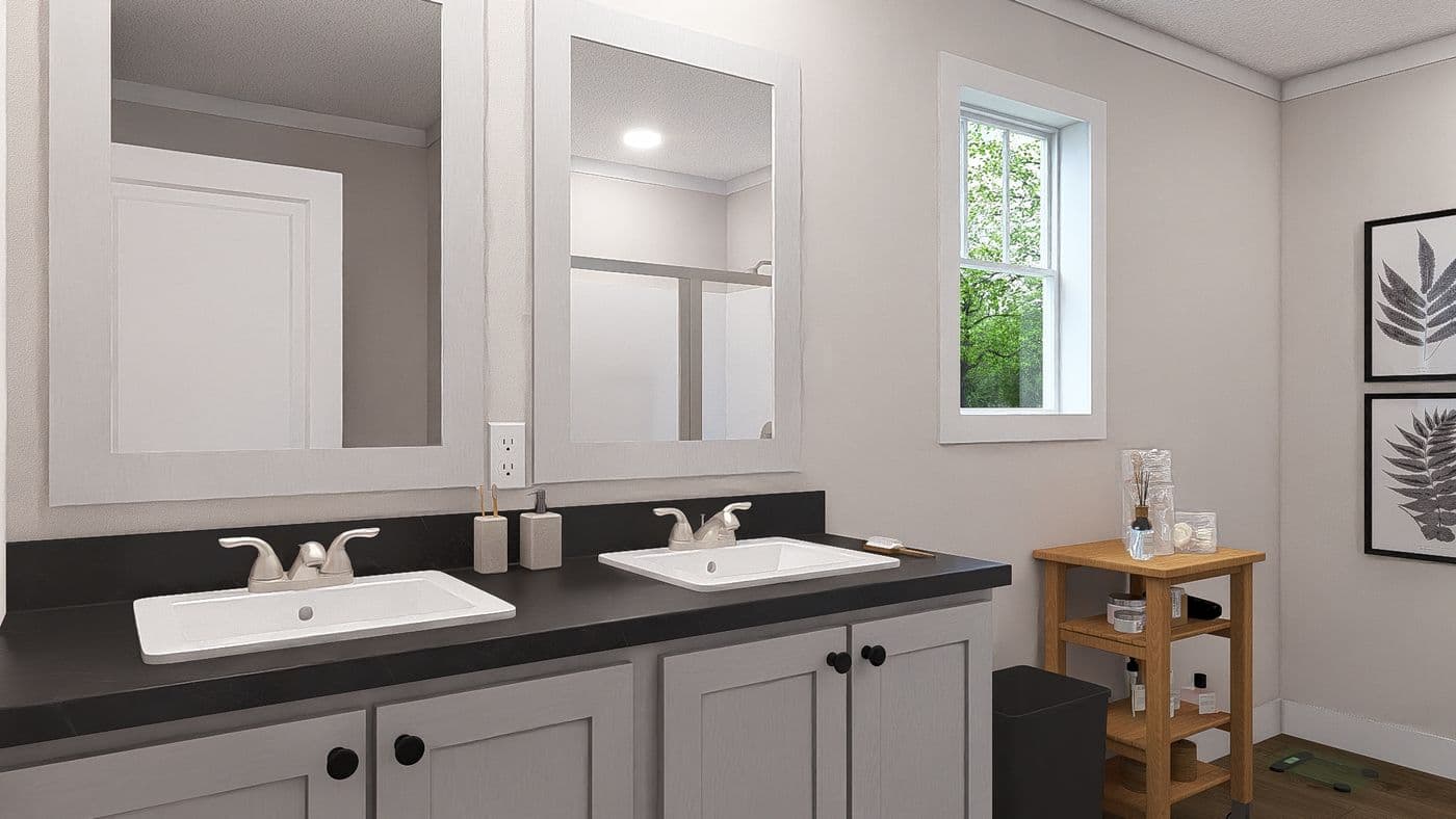 The HEY JUDE Primary Bathroom. This Manufactured Mobile Home features 4 bedrooms and 2 baths.