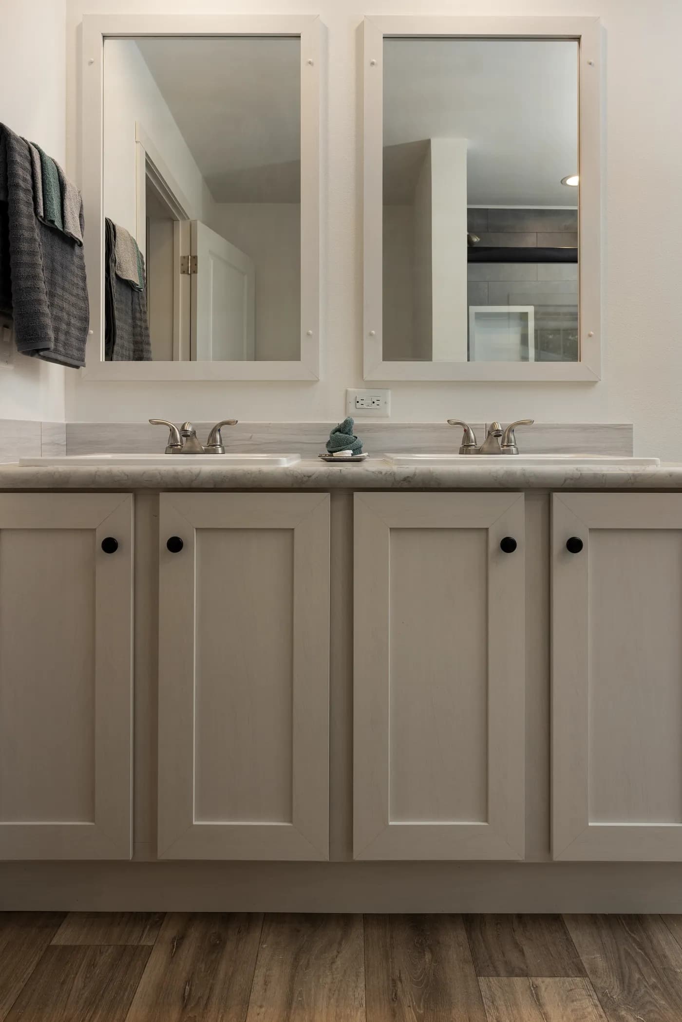 The HEY JUDE Primary Bathroom. This Manufactured Mobile Home features 4 bedrooms and 2 baths.