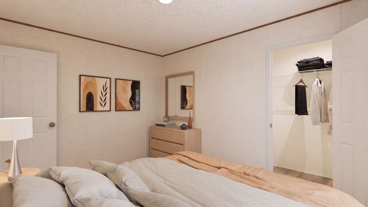 The SPRUCE Bedroom. This Manufactured Mobile Home features 3 bedrooms and 2 baths.