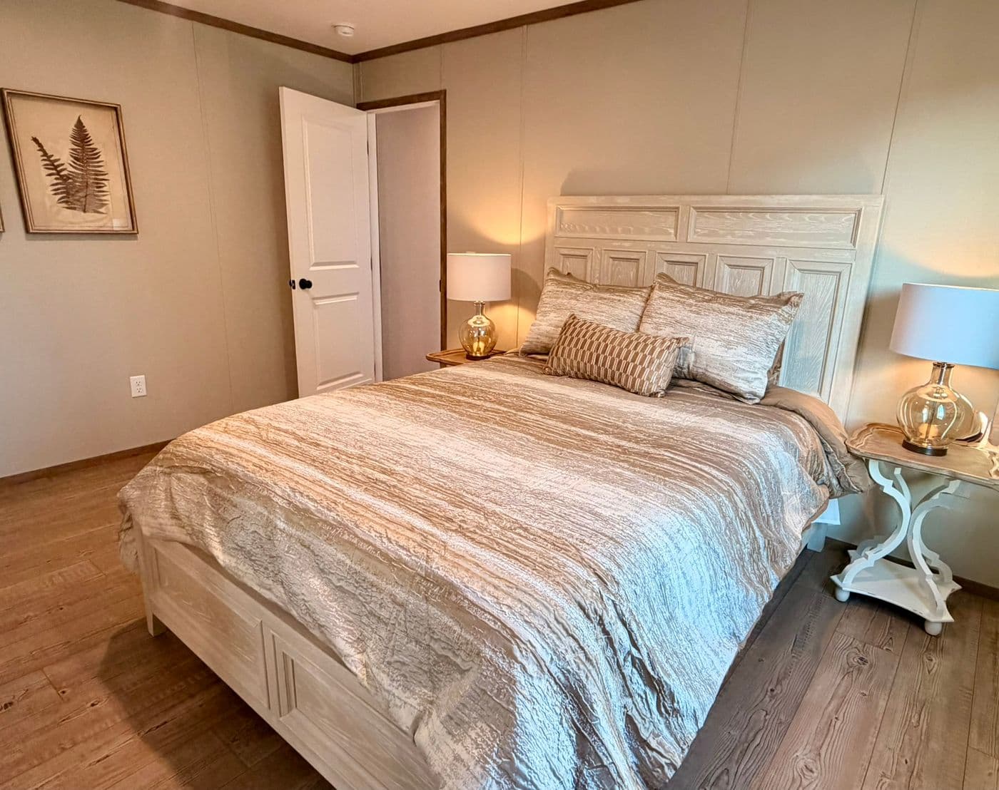 The BERYL Primary Bedroom. This Manufactured Mobile Home features 3 bedrooms and 2 baths.