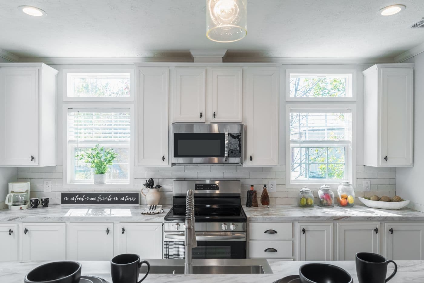 The THE HEWITT Kitchen. This Manufactured Mobile Home features 4 bedrooms and 3 baths.
