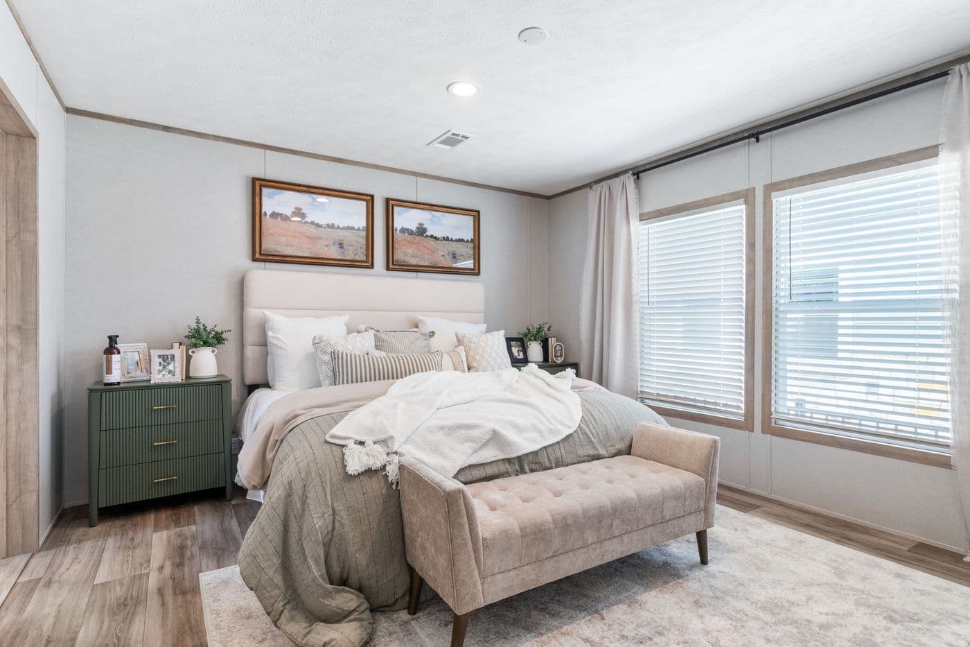 The THE REAL DEAL Primary Bedroom. This Manufactured Mobile Home features 3 bedrooms and 2 baths.