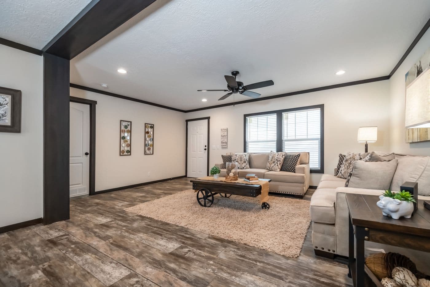 The BOUJEE 2 Living Room. This Manufactured Mobile Home features 3 bedrooms and 2 baths.
