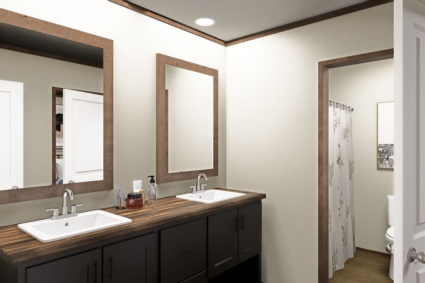 The SNOWCAP Guest Bathroom. This Manufactured Mobile Home features 4 bedrooms and 3 baths.