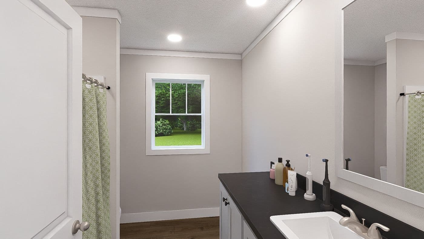 The SHOUT Guest Bathroom. This Manufactured Mobile Home features 3 bedrooms and 2 baths.