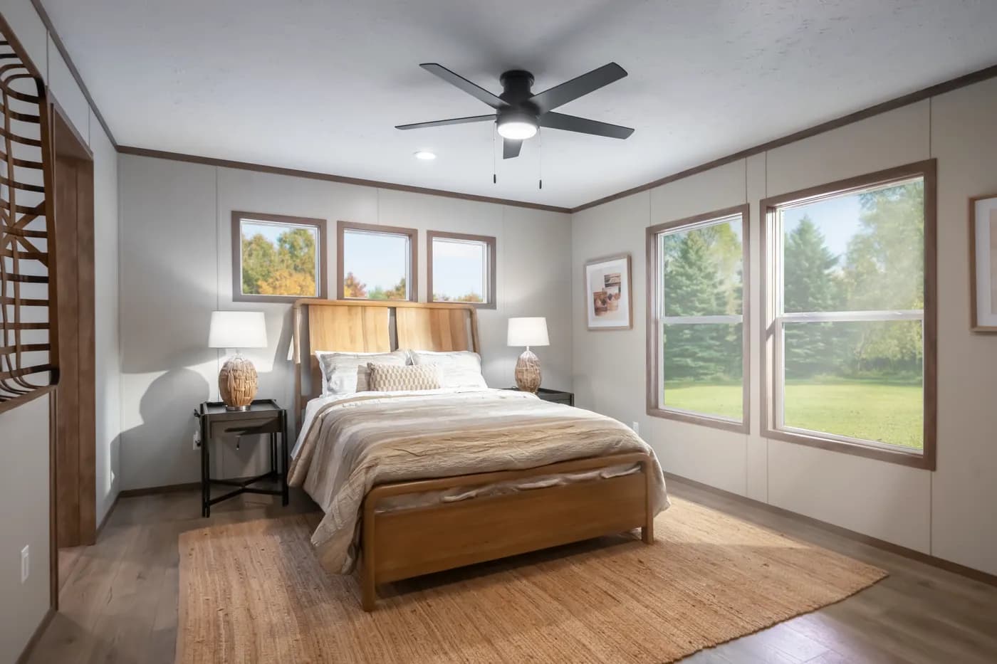 The SEVIER Primary Bedroom. This Manufactured Mobile Home features 4 bedrooms and 3 baths.