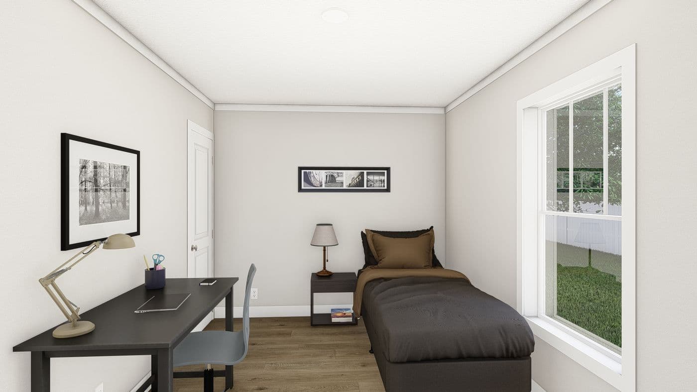 The SWEET CAROLINE Guest Bedroom. This Manufactured Mobile Home features 3 bedrooms and 2 baths.