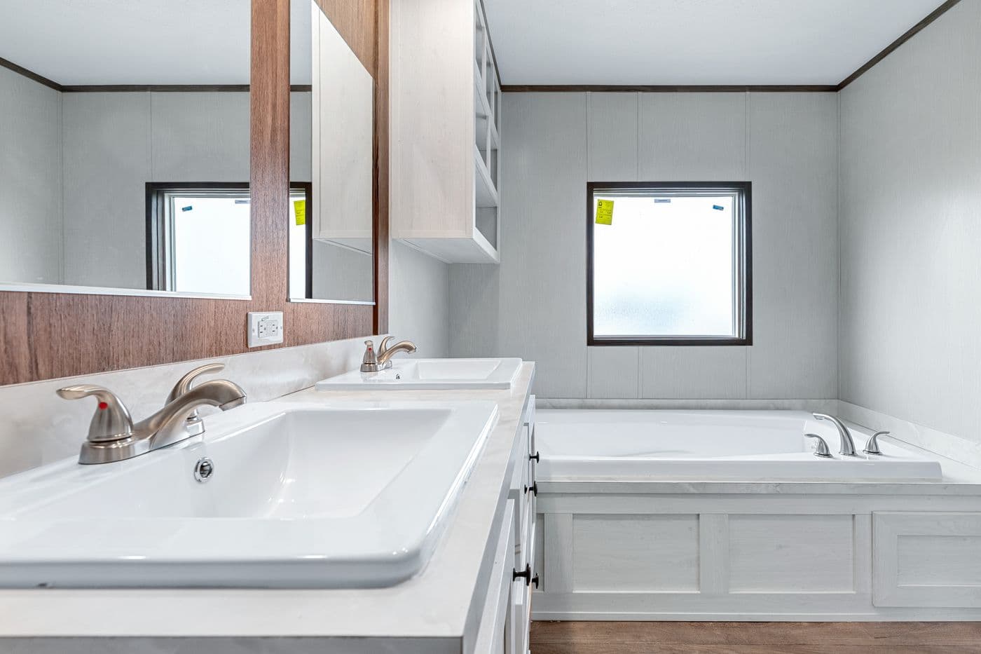 The ANNIVERSARY 16683B Primary Bathroom. This Manufactured Mobile Home features 3 bedrooms and 2 baths.