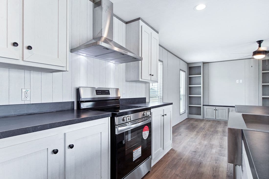 The RESOLUTION 16682X Kitchen. This Manufactured Mobile Home features 2 bedrooms and 2 baths.