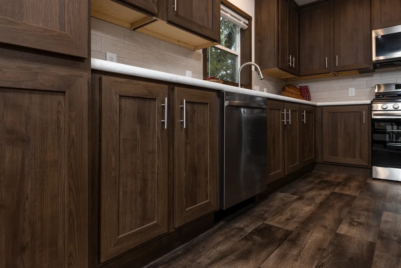The RAMSEY 75 Kitchen. This Manufactured Mobile Home features 4 bedrooms and 2 baths.