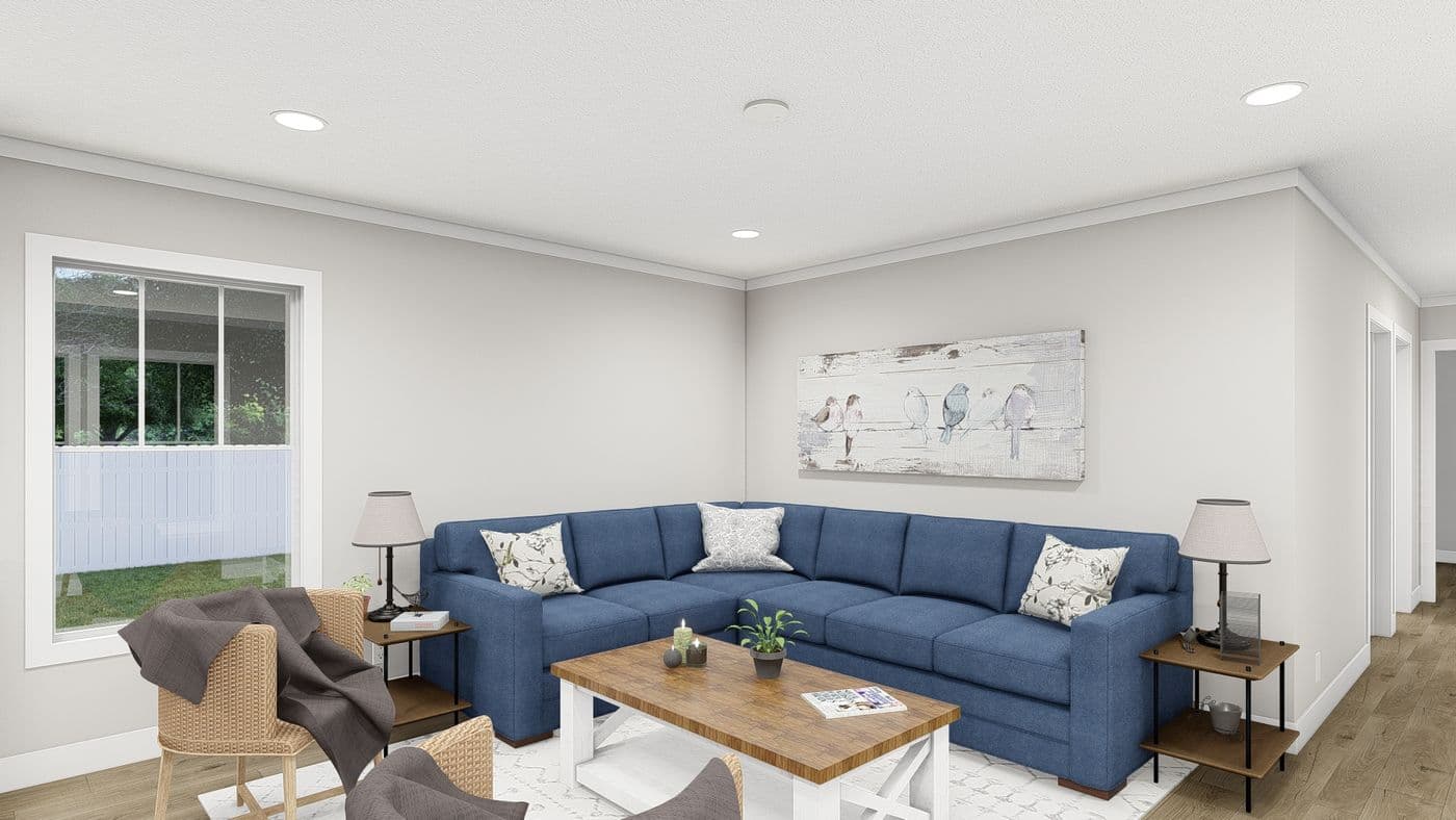 The MOVE ON UP Living Room. This Manufactured Mobile Home features 3 bedrooms and 2 baths.