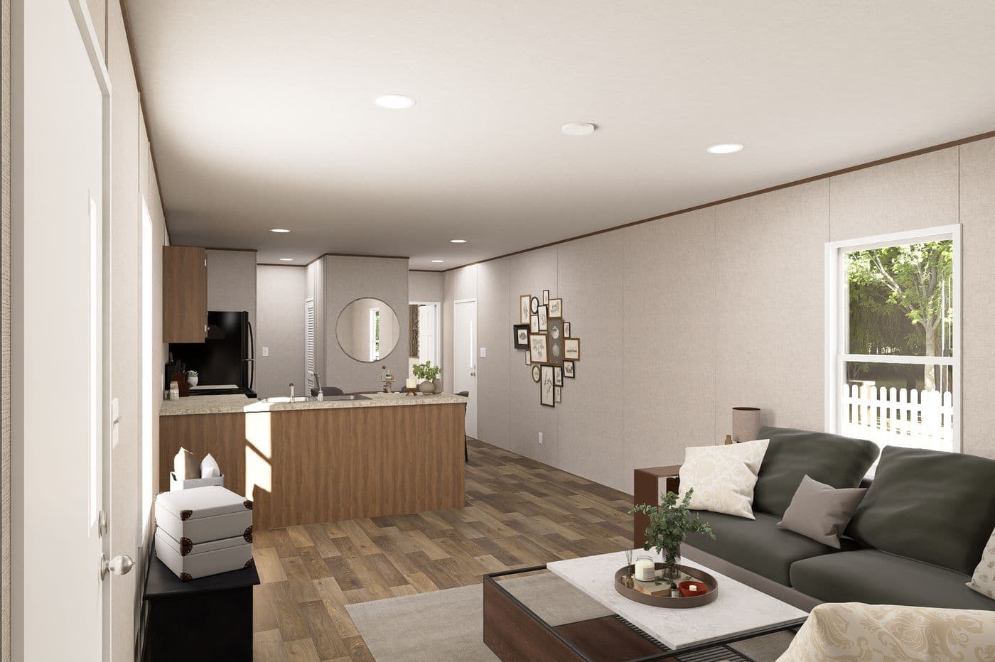 The MAGNOLIA Living Room. This Manufactured Mobile Home features 3 bedrooms and 2 baths.