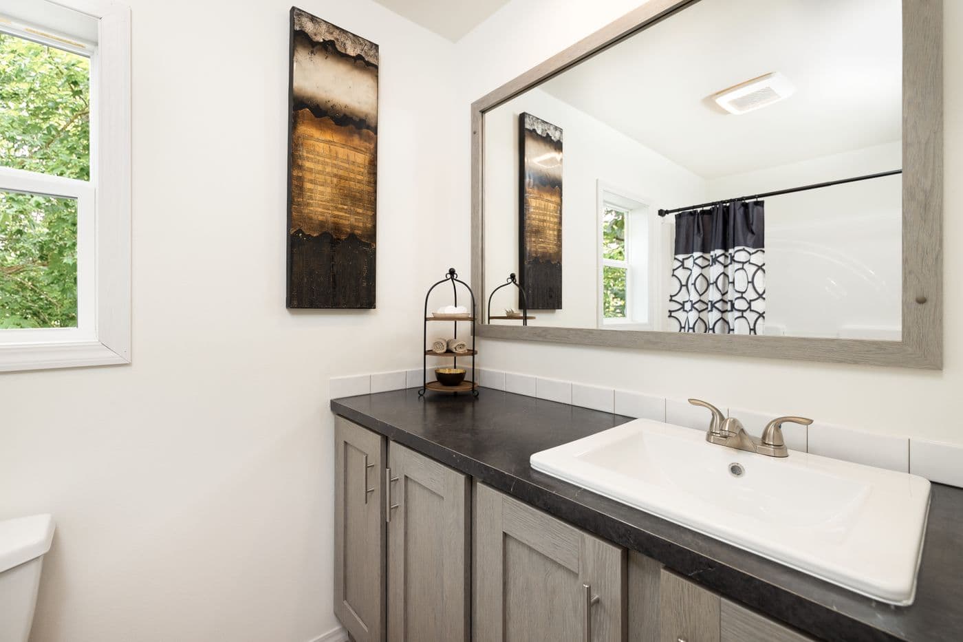 The RAMSEY 216-2 Primary Bathroom. This Manufactured Mobile Home features 3 bedrooms and 2 baths.