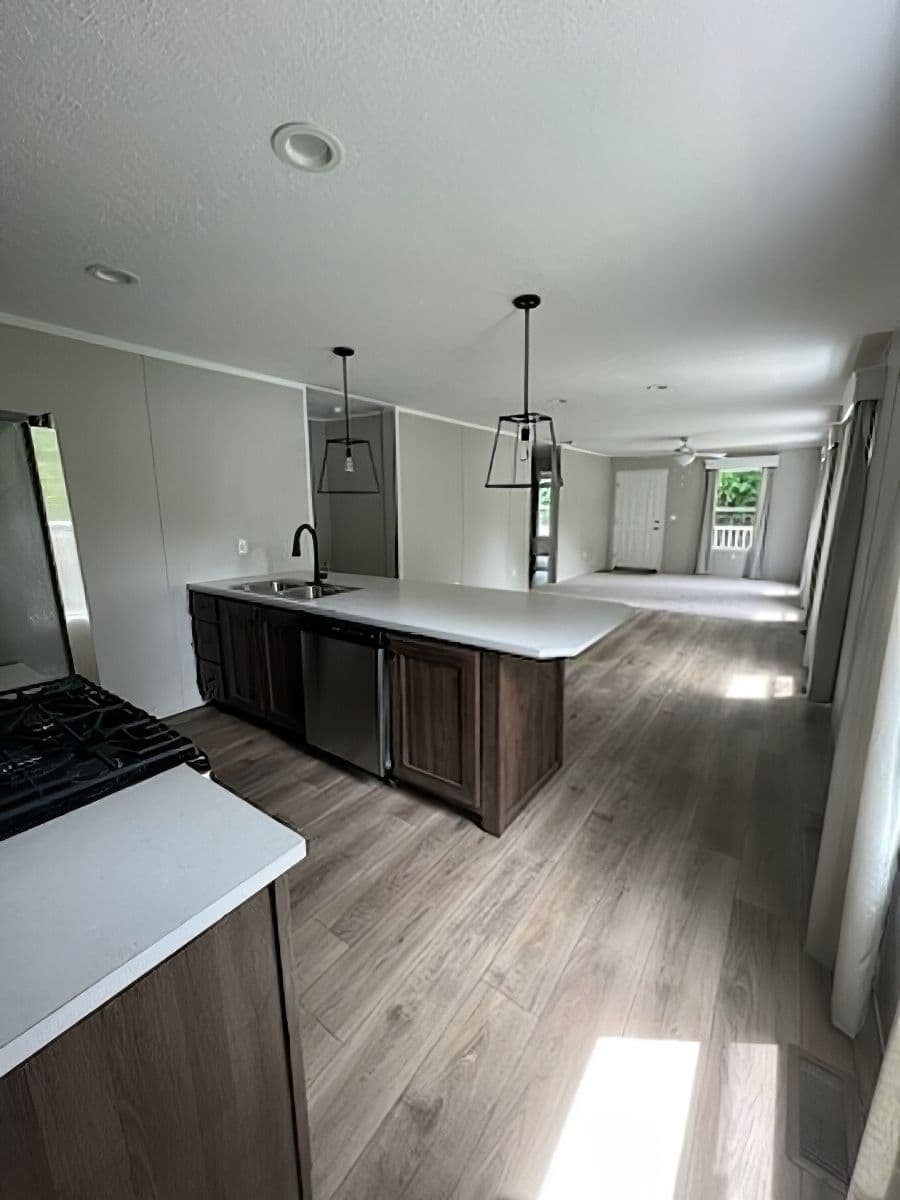 The JADE 40 Kitchen. This Manufactured Mobile Home features 2 bedrooms and 2 baths.