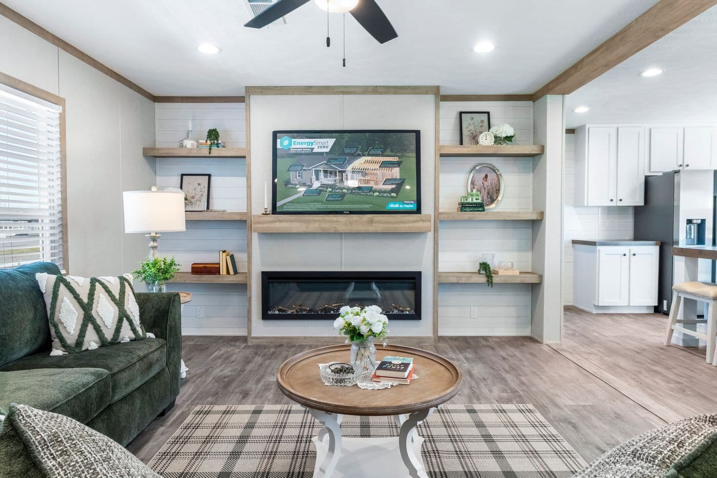 The THE BIG DEAL 52 Living Room. This Manufactured Mobile Home features 3 bedrooms and 2 baths.