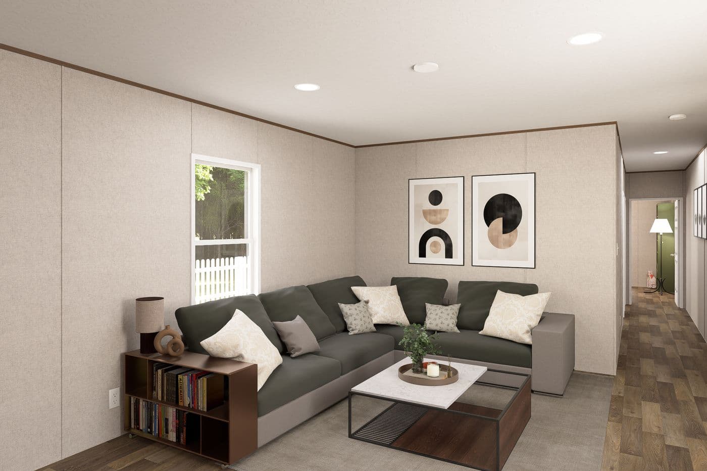 The MAGNOLIA Living Room. This Manufactured Mobile Home features 3 bedrooms and 2 baths.