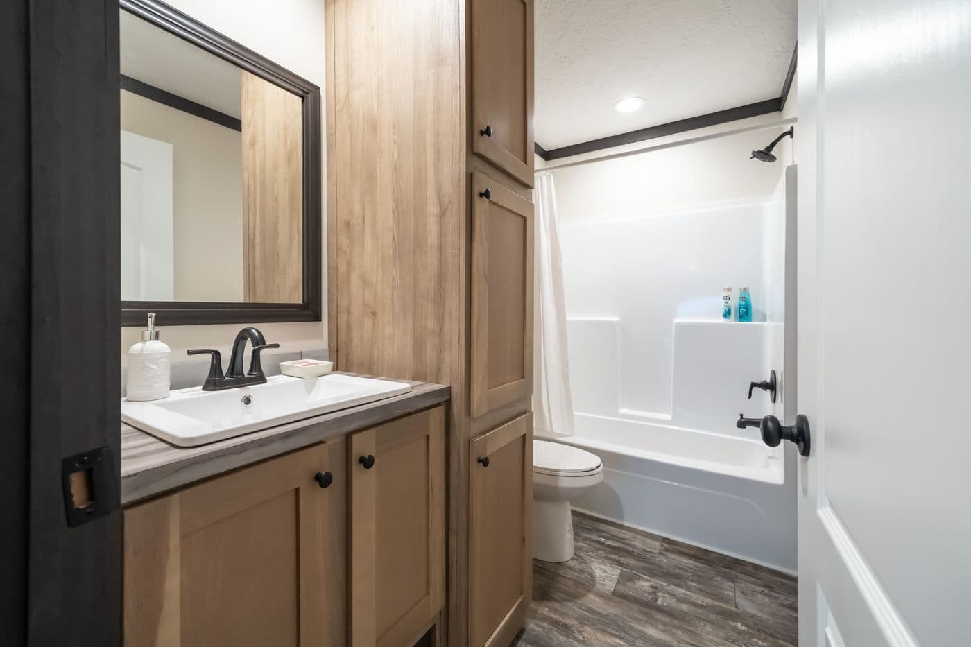 The BOUJEE 2 Primary Bathroom. This Manufactured Mobile Home features 3 bedrooms and 2 baths.