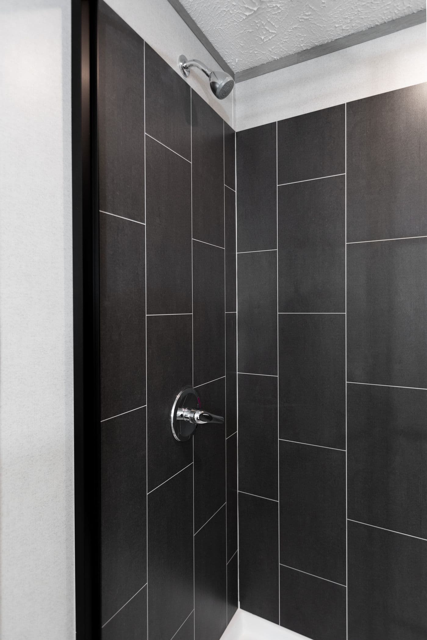 The PLATINUM ANNIVERSARY Primary Bathroom. This Manufactured Mobile Home features 3 bedrooms and 2 baths.