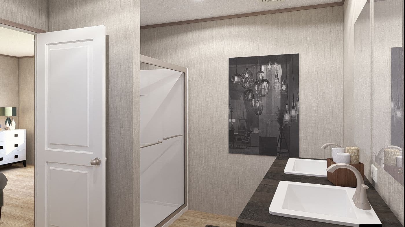 The ULTRA A-PLUS 16X76 Primary Bathroom. This Manufactured Mobile Home features 3 bedrooms and 2 baths.