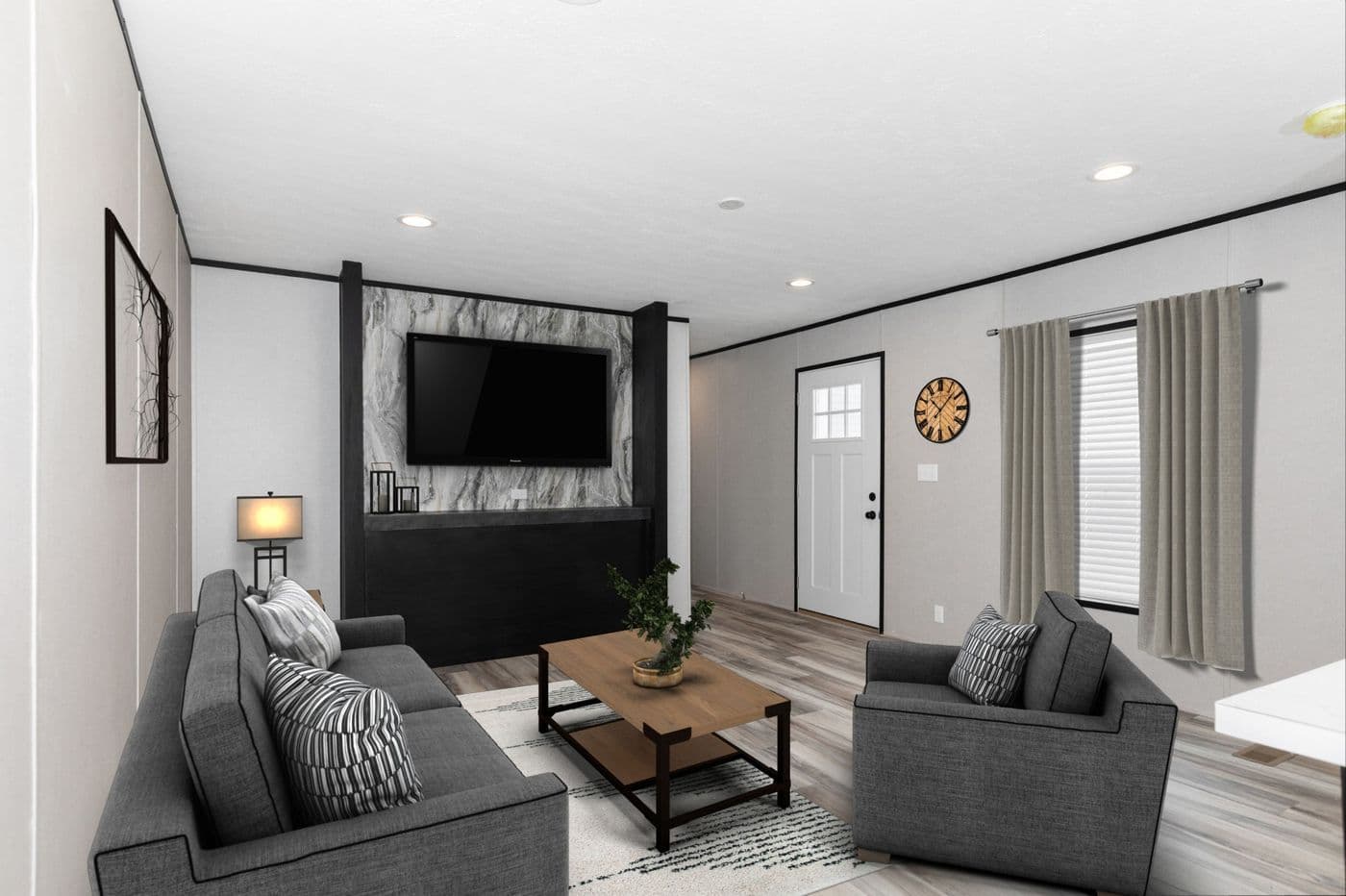 The THE FUJI Living Room. This Manufactured Mobile Home features 3 bedrooms and 2 baths.