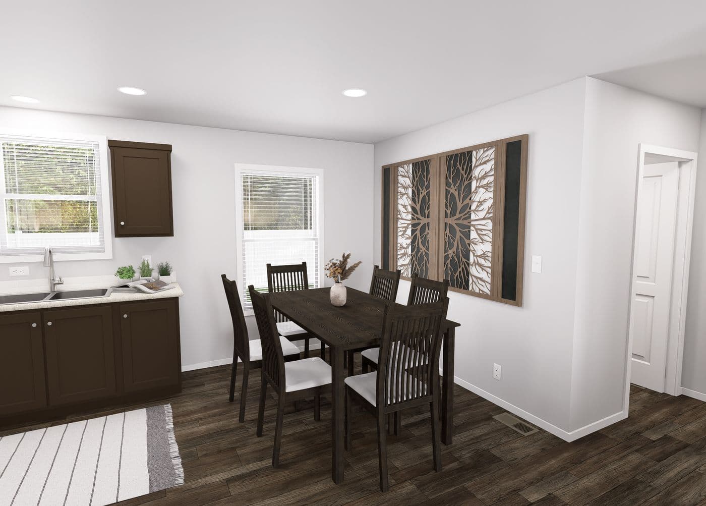 The SLE 481F Dining Area. This Manufactured Mobile Home features 3 bedrooms and 2 baths.