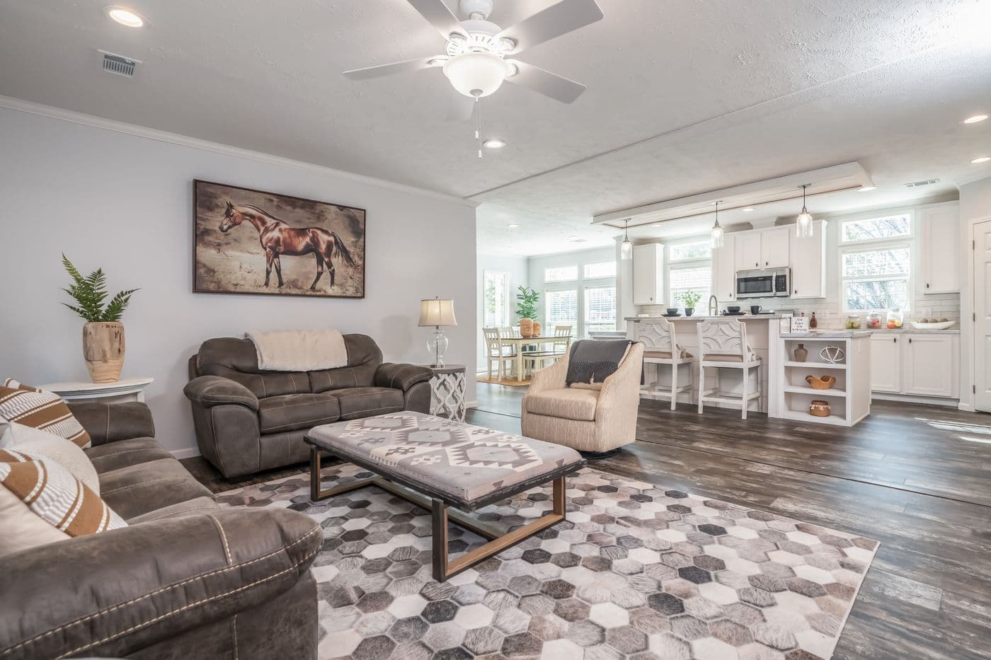The THE HEWITT Living Room. This Manufactured Mobile Home features 4 bedrooms and 3 baths.