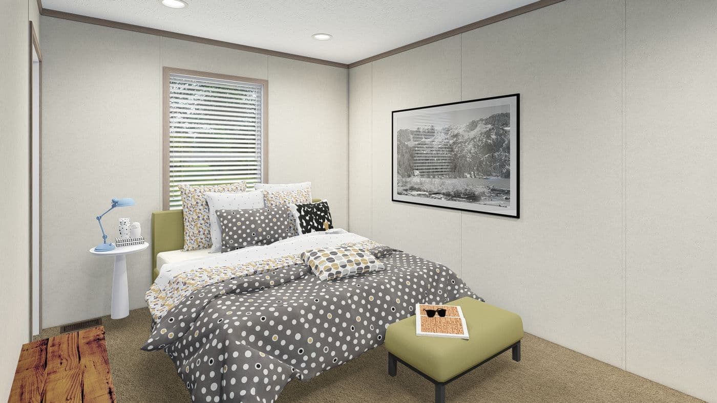 The 5216-4790 THE PULSE Primary Bedroom. This Manufactured Mobile Home features 2 bedrooms and 1 bath.