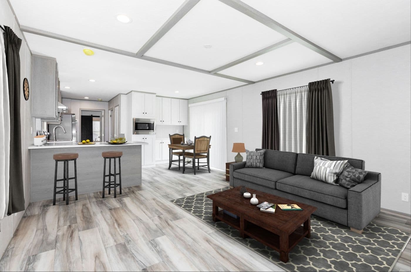 The THE OLYMPUS Living Room. This Manufactured Mobile Home features 3 bedrooms and 2 baths.