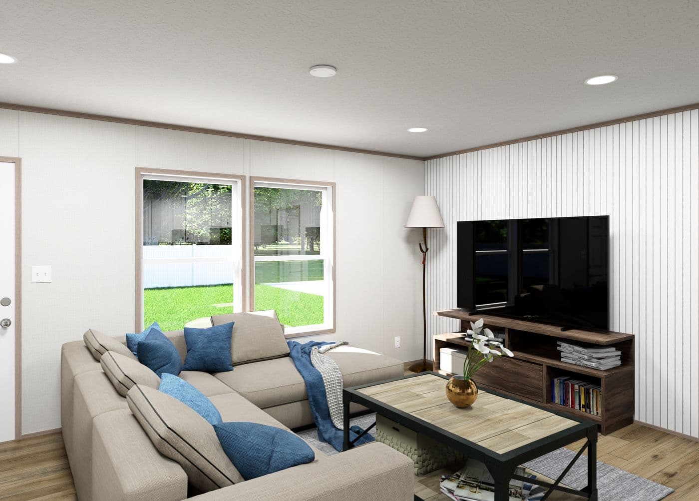 The ASPIRE Living Room. This Manufactured Mobile Home features 3 bedrooms and 2 baths.