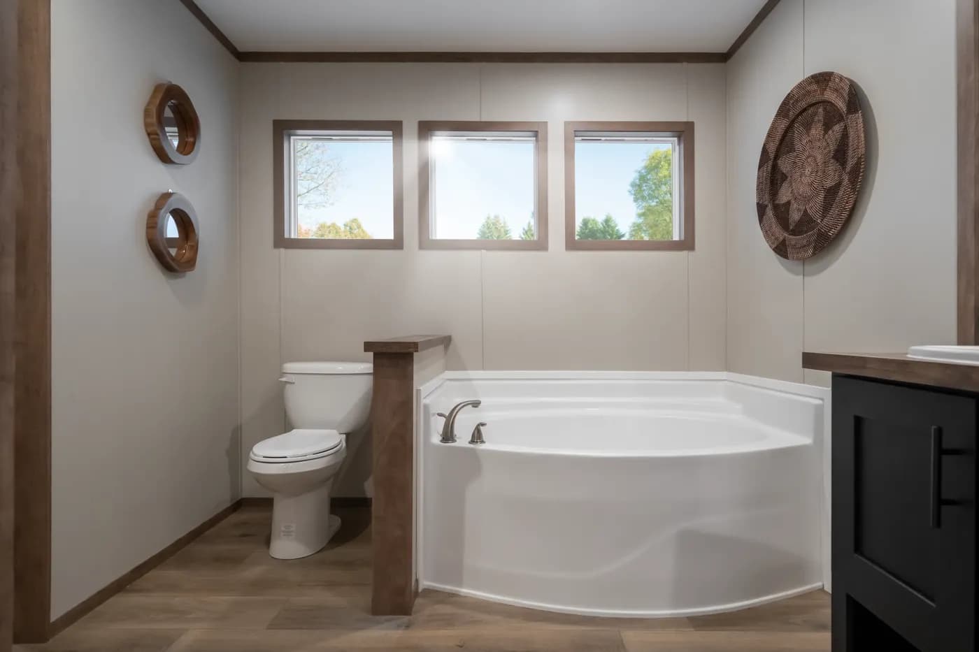 The SEVIER Primary Bathroom. This Manufactured Mobile Home features 4 bedrooms and 3 baths.