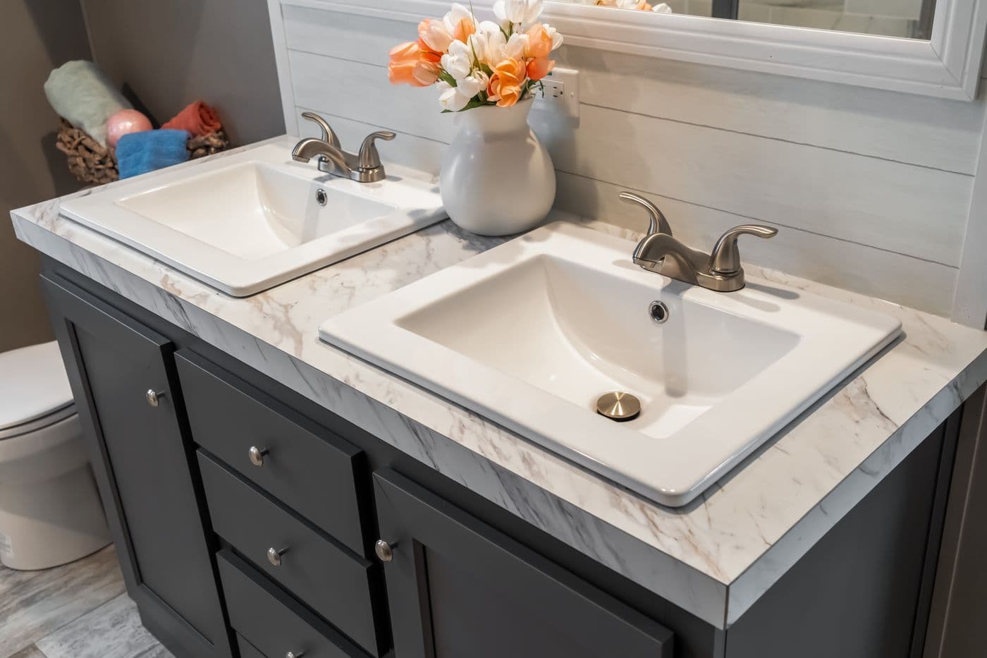 The THE DRIFTWOOD Primary Bathroom. This Manufactured Mobile Home features 3 bedrooms and 2 baths.