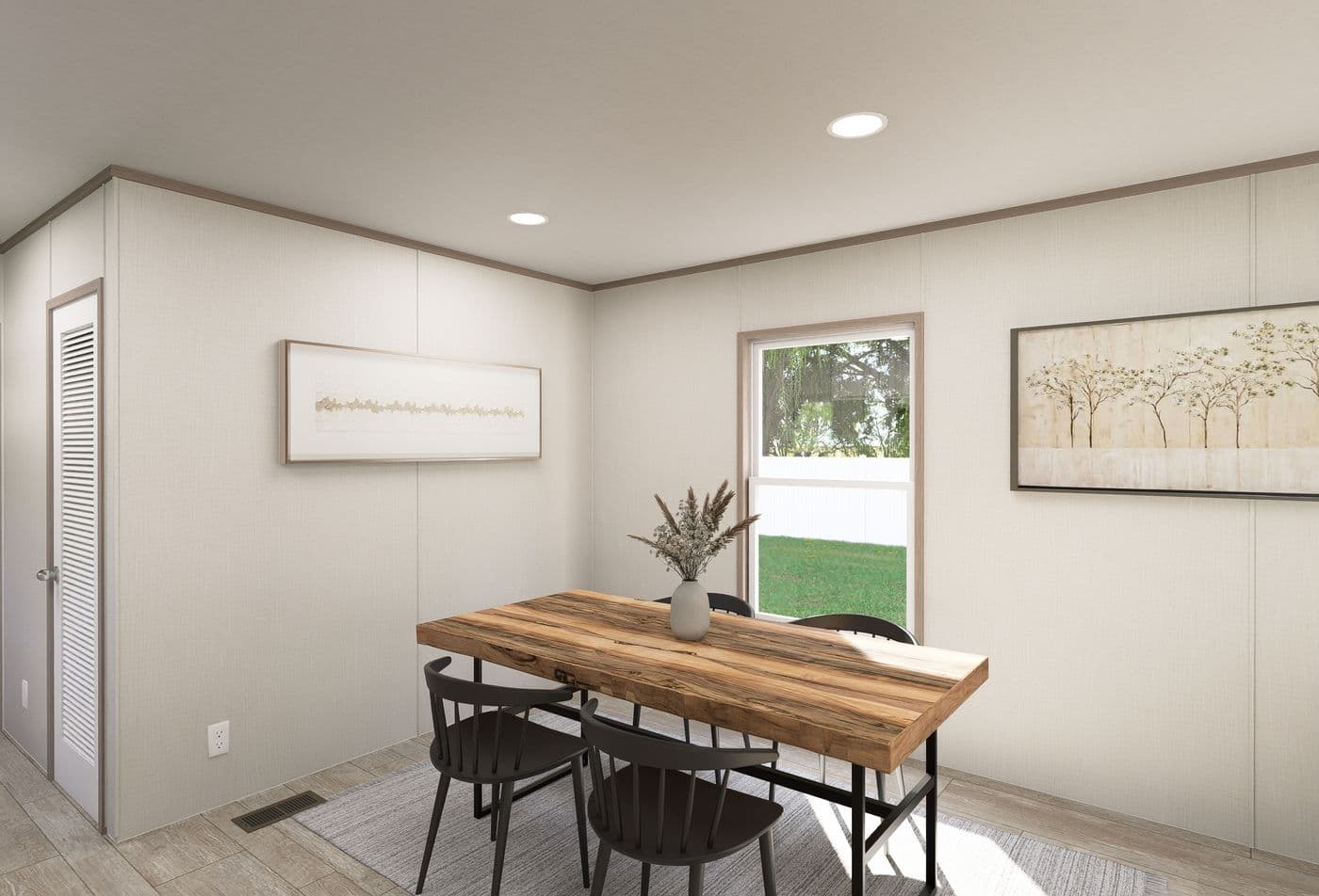 The FLEX ANNIVERSARY Dining Area. This Manufactured Mobile Home features 3 bedrooms and 2 baths.