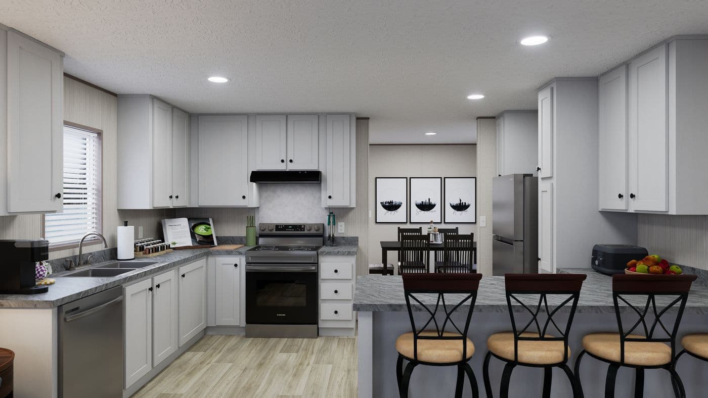 The ROCKY VALLEY Kitchen. This Manufactured Mobile Home features 3 bedrooms and 2 baths.