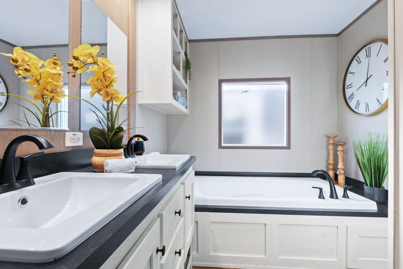 The ANNIVERSARY 16763A Primary Bathroom. This Manufactured Mobile Home features 3 bedrooms and 2 baths.