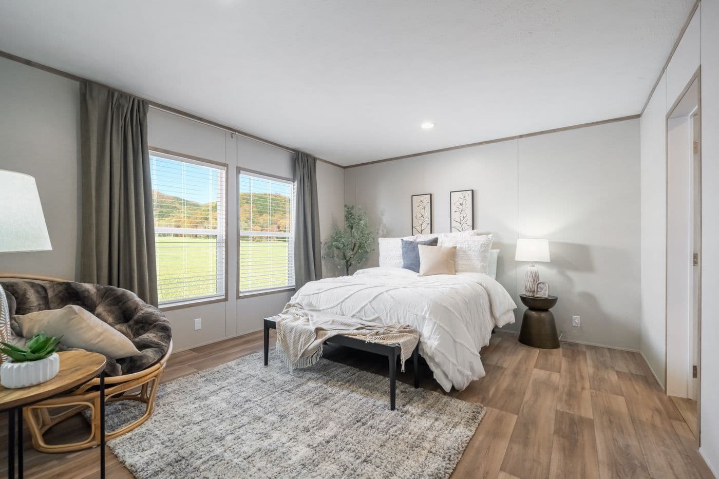 The ECLIPSE Primary Bedroom. This Manufactured Mobile Home features 4 bedrooms and 2 baths.