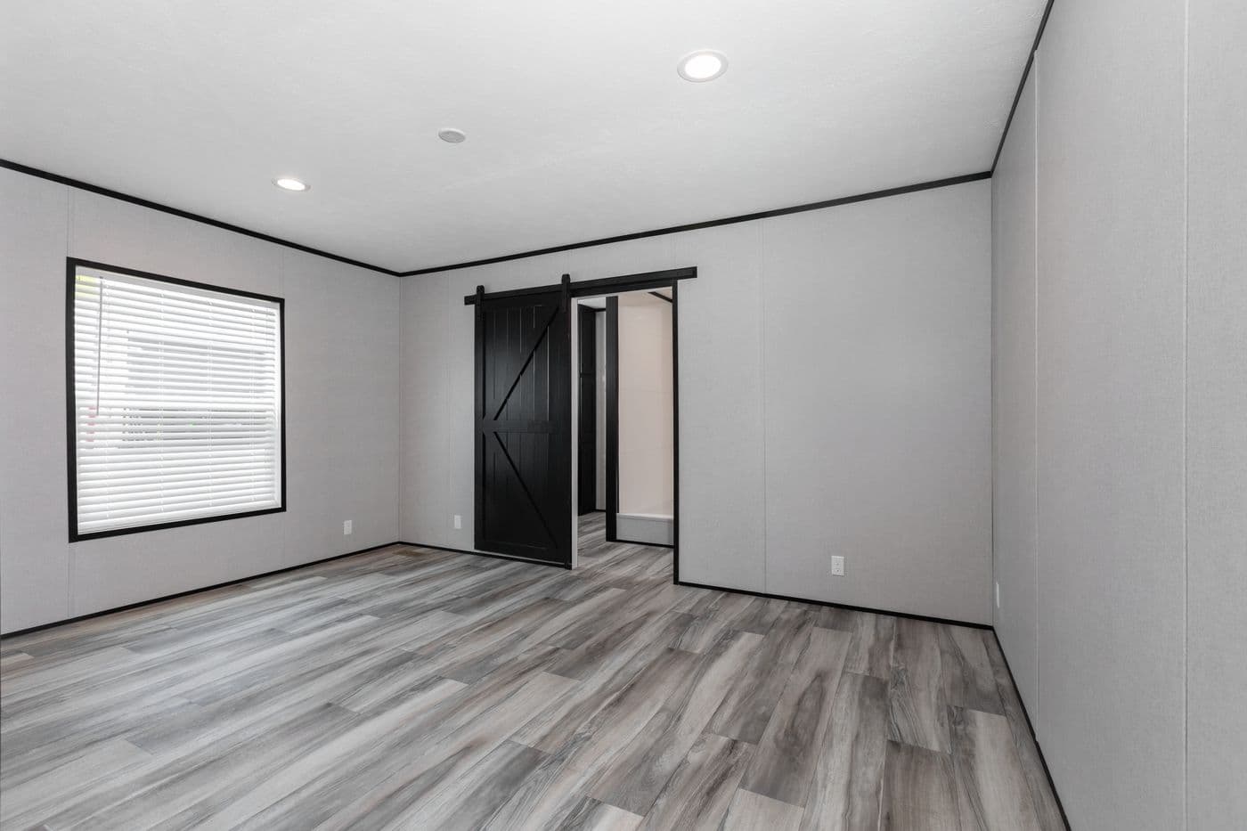 The THE SMOKEY Bedroom. This Manufactured Mobile Home features 3 bedrooms and 2 baths.
