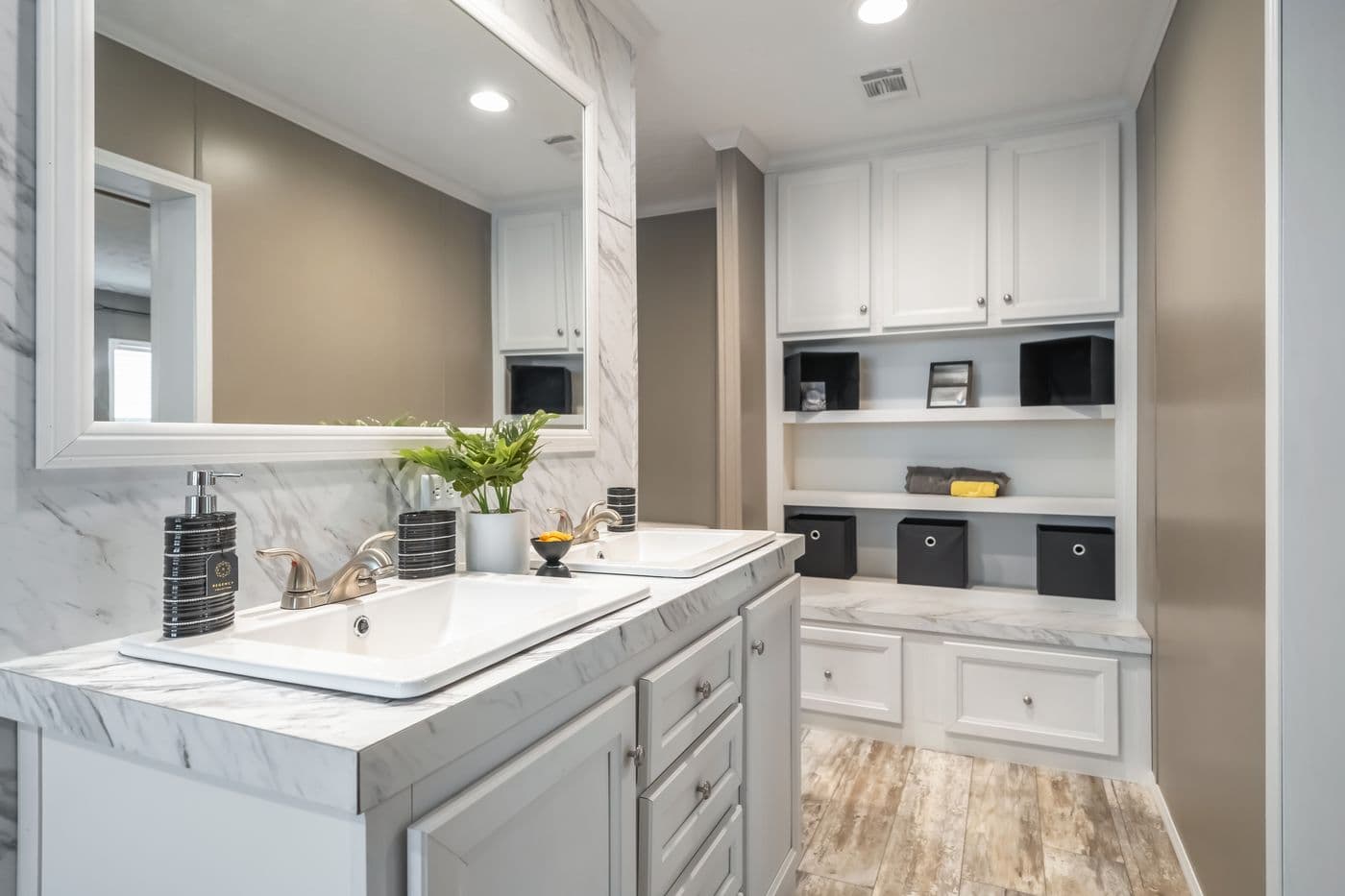 The CASCADE Primary Bathroom. This Manufactured Mobile Home features 4 bedrooms and 2 baths.