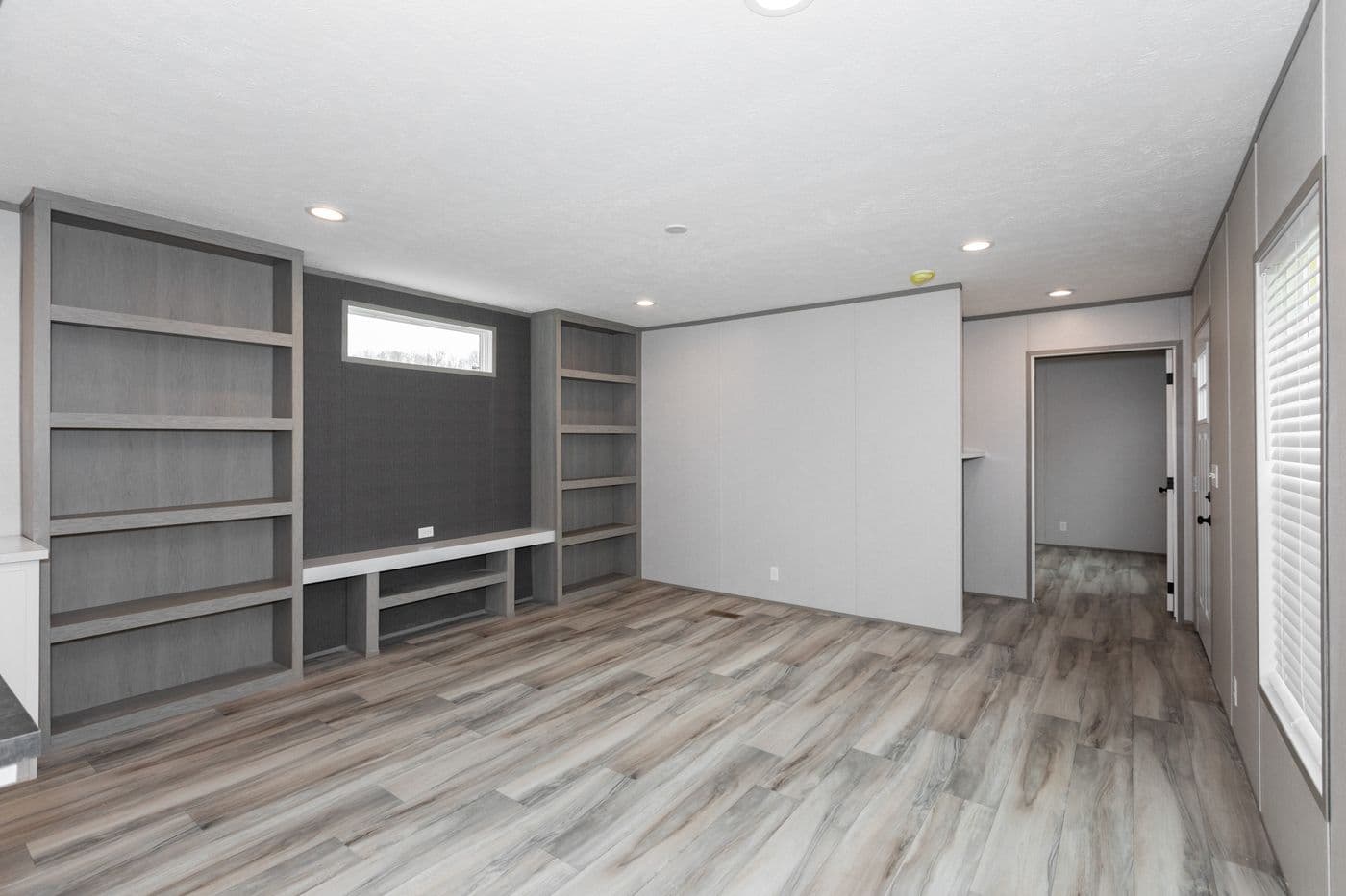 The PLATINUM ANNIVERSARY Living Room. This Manufactured Mobile Home features 3 bedrooms and 2 baths.