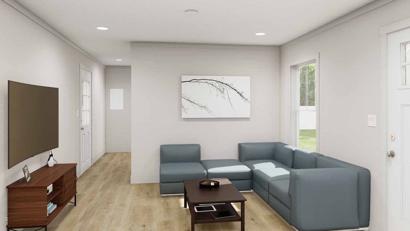 The GOOD VIBRATIONS Living Room. This Manufactured Mobile Home features 3 bedrooms and 2 baths.