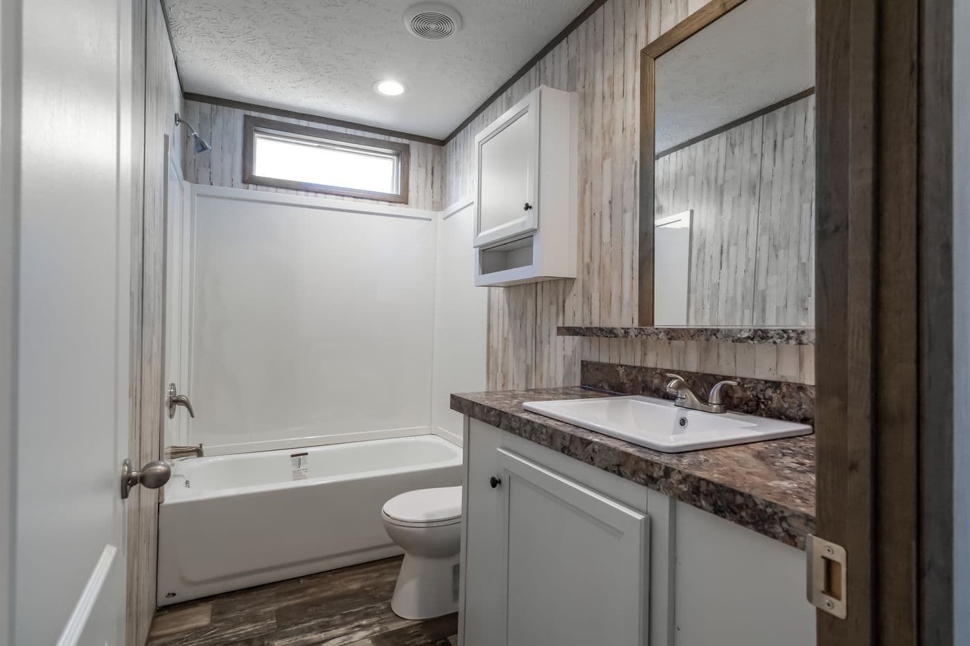 The NUMBER ONE Exterior. This Manufactured Mobile Home features 3 bedrooms and 2 baths.